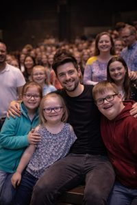 Phil Wickham Visits and Donates $700,000 to Support Down Syndrome Community in Alabama Before Birmingham Show.